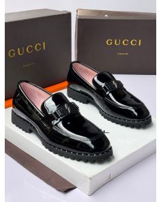 Gucci tick sole